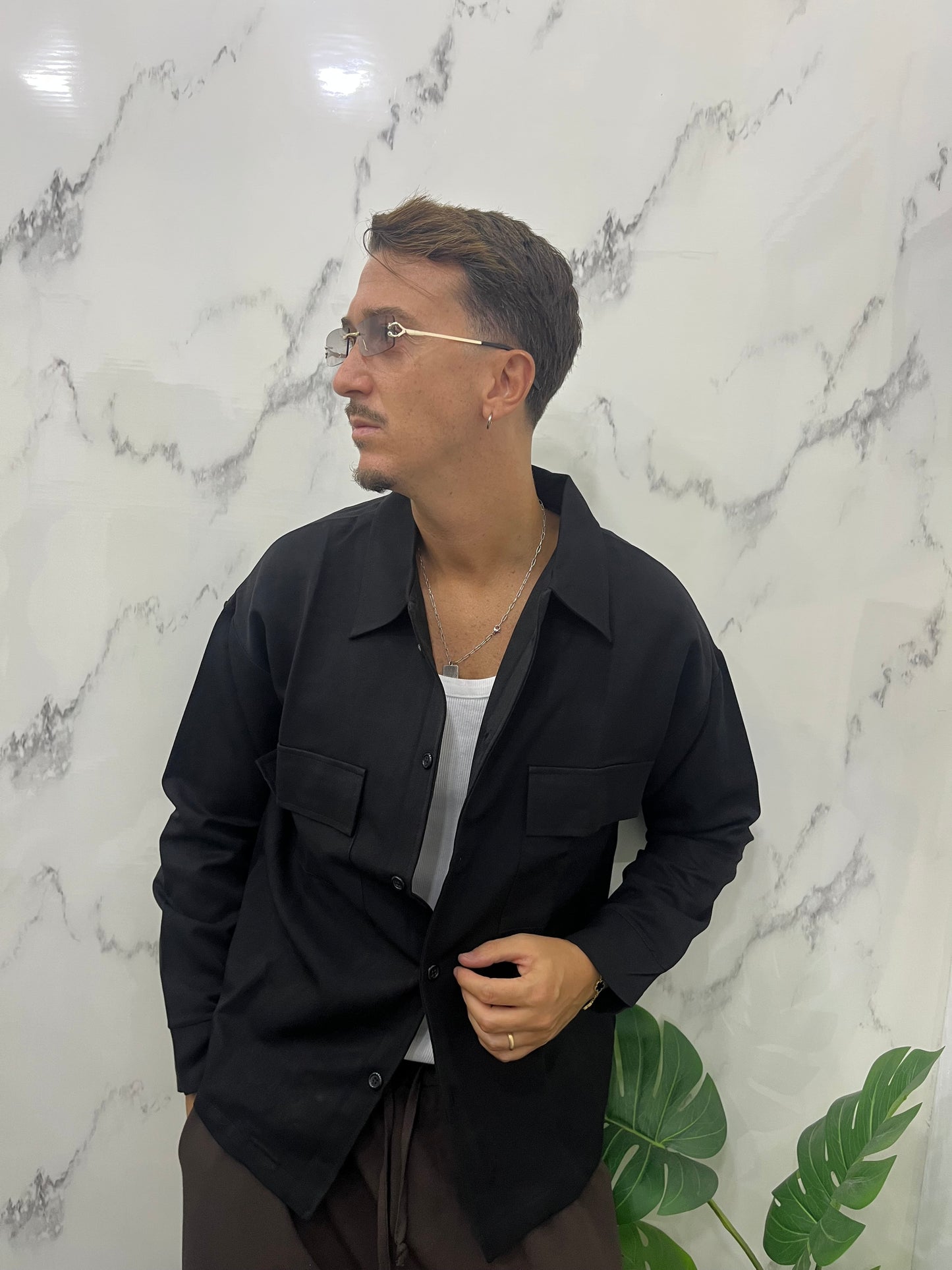 CAMICIA CON TASCONI